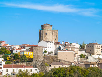 Town against blue sky