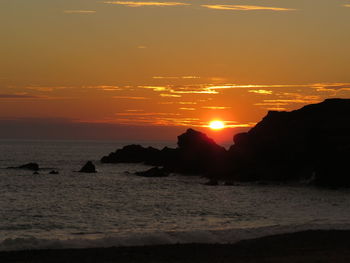 Dramatic sky over sea during sunset