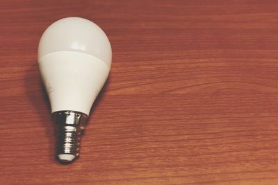 Close-up of lamp on table