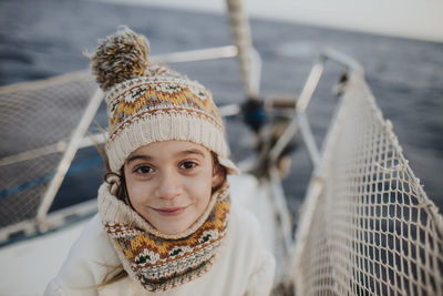 Portrait of smiling mid adult woman in sea