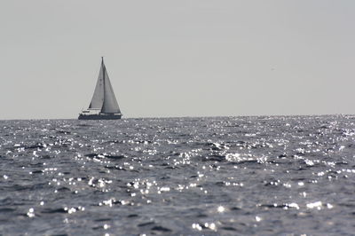 Boat sailing in sea