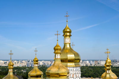 Temple against building and blue sky in ukraine