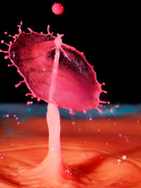 Close-up of water splashing on black background