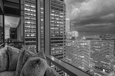 Modern buildings in city against sky