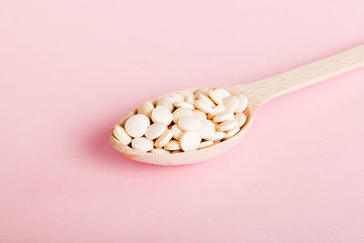 Close-up of pills in spoon