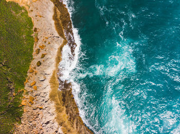 Aerial landscape with a split line between water and the ground shore from puerto rico island