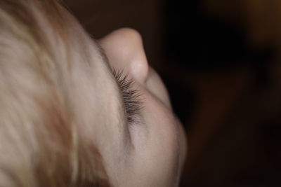 Close-up of girl wearing hat