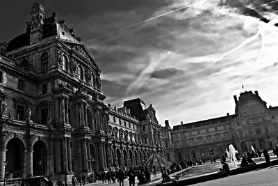 Tourists in front of historic building