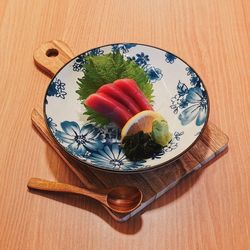 High angle view of fruits in plate on table