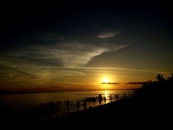 Scenic view of sea at sunset