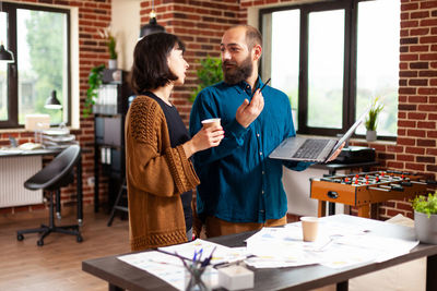 Business colleagues working at office