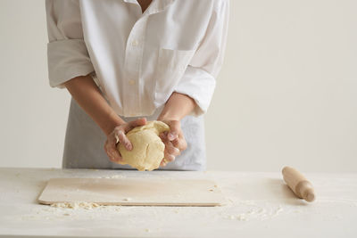 Midsection of woman preparing food