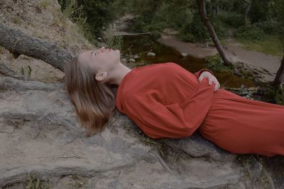 High angle view of woman lying down