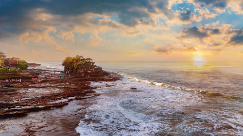 Scenic view of sea against sky during sunset