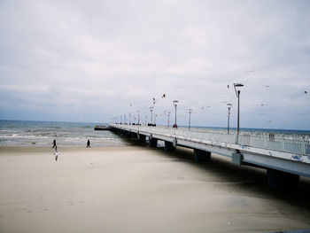 A lovely cream view of a baltic coastline being cut by a large walkway