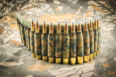 Close-up of bullets on table 