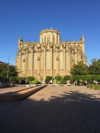 View of historical building against clear blue sky