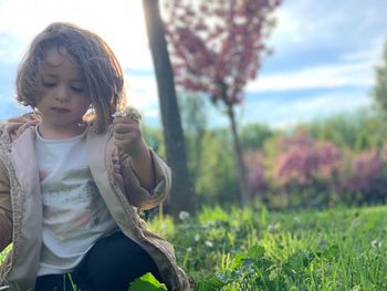 Girl looking at camera on field