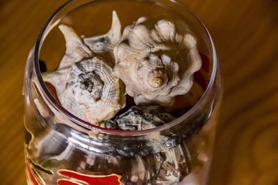 High angle view of ice cream in glass jar on table