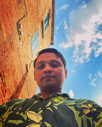 Low angle view of young man