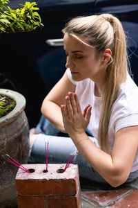 Young woman painting