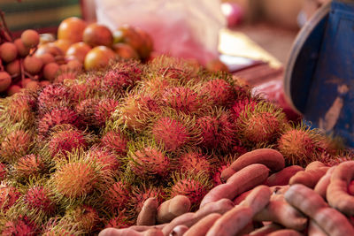 Cropped image of fruits for sale in market