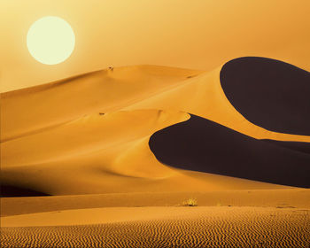 Low angle view of sand dunes in desert