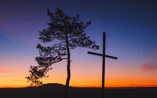 Low angle view of silhouette tree against sky during sunset