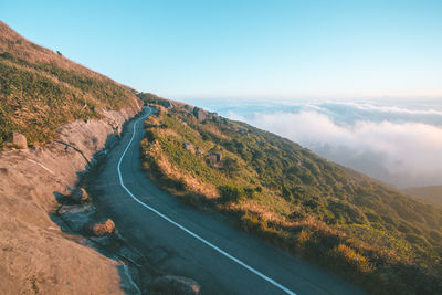 Country road leading towards mountains