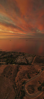 Aerial view of city during sunset