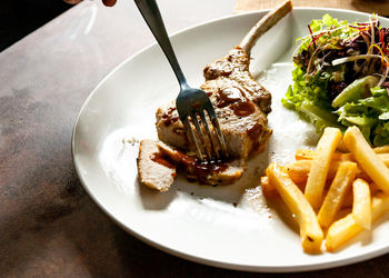 Close-up of food served on table