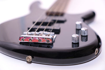 Close-up of guitar on table