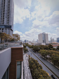 Modern buildings against sky in city