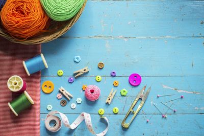 High angle view of sewing equipment on table