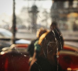 Close-up of wet glass window in rainy season