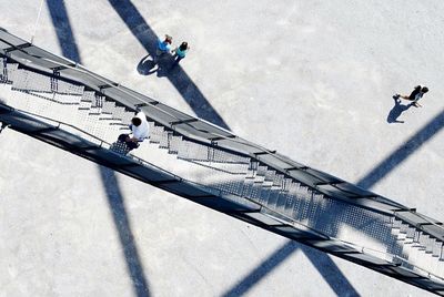 High angle view of man with umbrella against sky