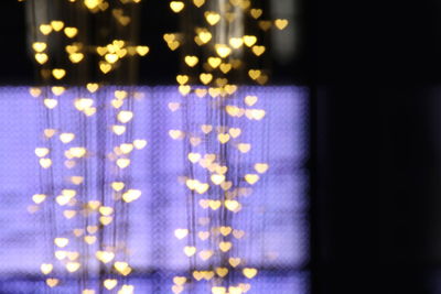 Defocused image of illuminated christmas lights