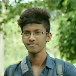 Portrait of young man wearing eyeglasses