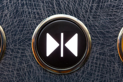 Close-up of illuminated elevator button