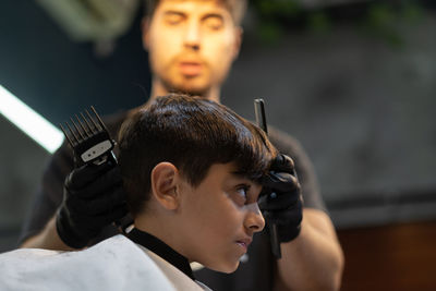 Portrait of boy at hairdresser