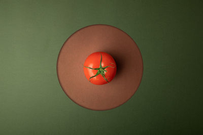 High angle view of orange fruit on table