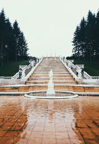 View of fountain in park against clear sky