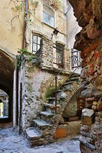 Low angle view of stairs in abandoned building