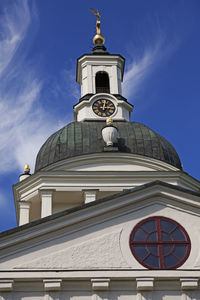 Part of the city church against blue summer sky