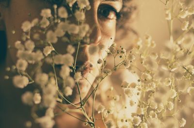 Portrait of sensual woman with flowers