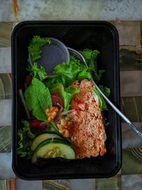 High angle view of vegetables in plate on table