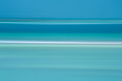 Defocused image of blue water