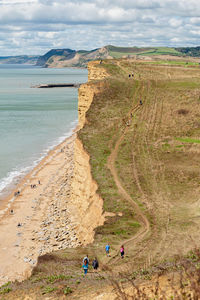 High angle view of people on sea shore