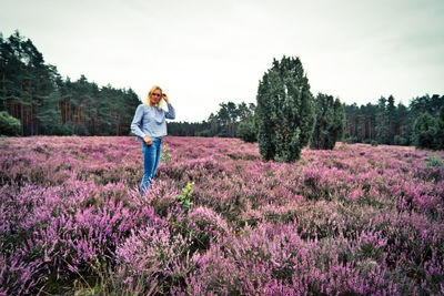 Full length of woman standing on field