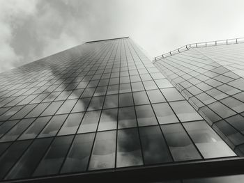 Low angle view of skyscraper against sky